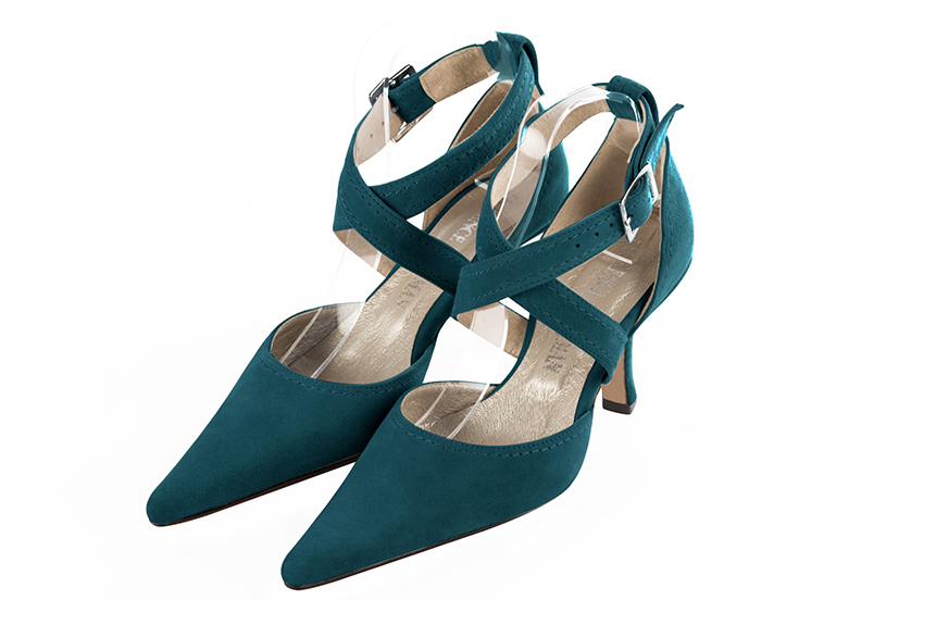 Women's peacock blue open side dress shoes, with crossed straps. Pointed toe. High spool heels - Front view